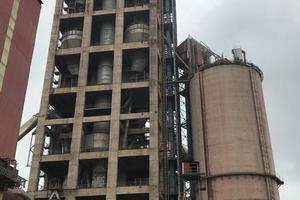 Kiln feeding by bucket elevator