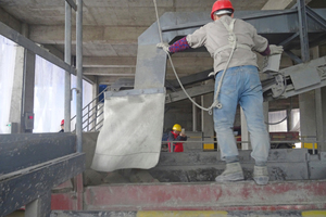 1 Manual truck loading in 2015 at Pingxiang Sinoma, where currently, a new technology and automatic loading project is being scheduled