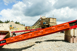 7 Conveyor guarding prevents reach-in, but also constrains fugitive debris to under the system